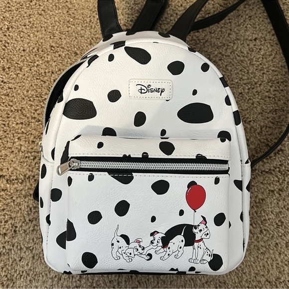 Loungefly Handbags - NWOT Disney Loungefly 101 Dalmatians backpack, black & white spots, red balloon